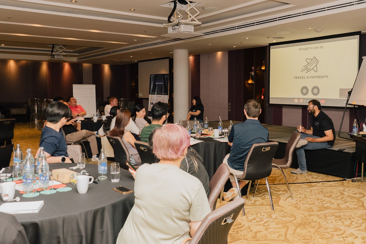 Payments professionals discussing a case study