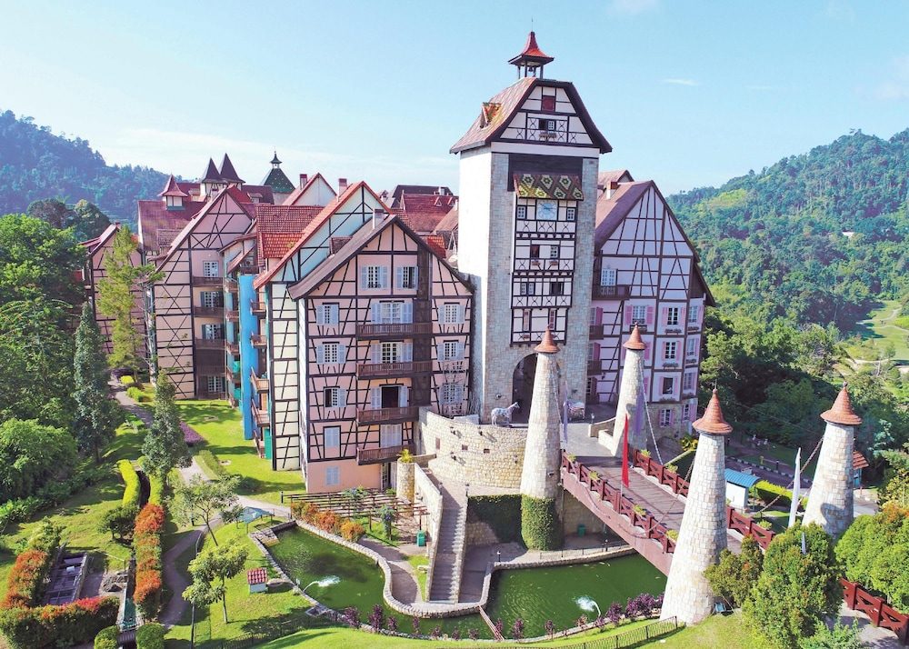 Colmar Tropicale from above: half-timbered French houses, the clock-tower gate, turrets and a drawbridge over the moat