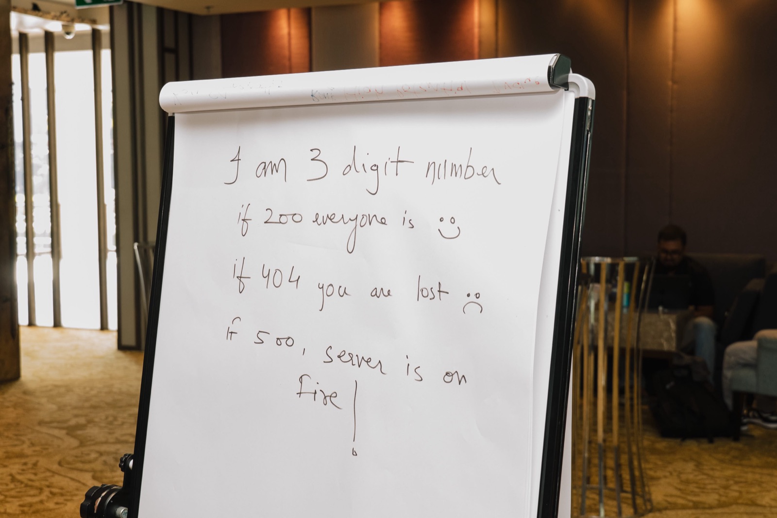 A flip chart riddle from a retreat game: 200 everyone is happy, 404 you are lost, 500 the server is on fire